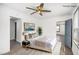Staged bedroom boasts a plush bed, stylish decor, and plenty of natural light at 441 Pomona Sw Cir, Atlanta, GA 30315