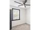Bright bedroom featuring a ceiling fan and a window, providing a comfortable and inviting atmosphere at 441 Pomona Sw Cir, Atlanta, GA 30315