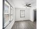 Bedroom features natural light, gray trim and a ceiling fan at 441 Pomona Sw Cir, Atlanta, GA 30315