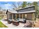 Staged patio area offers an outdoor living space perfect for entertaining guests with cozy furniture at 441 Pomona Sw Cir, Atlanta, GA 30315