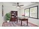 Cozy office space featuring a bookshelf, a desk, a rug, and a window, perfect for work or study at 441 Pomona Sw Cir, Atlanta, GA 30315