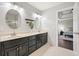 Spacious bathroom featuring a double vanity, neutral tones, and modern lighting at 241 Lancaster Cir, Marietta, GA 30066