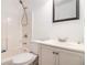 Bathroom featuring a shower-tub combo, white vanity, toilet, and modern faucet at 4230 Spur Look Xing, Douglasville, GA 30135