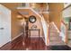 Inviting foyer with hardwood floors, staircase, and decorative accents at 4230 Spur Look Xing, Douglasville, GA 30135