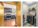 View into laundry room with gray cabinets and modern appliances at 4230 Spur Look Xing, Douglasville, GA 30135