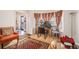 Bright living room with patterned rug, comfortable seating, and natural light at 4230 Spur Look Xing, Douglasville, GA 30135