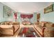 Spacious living room with large windows, comfortable seating, and a cozy ambiance at 4230 Spur Look Xing, Douglasville, GA 30135