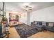 Living room with neutral walls, gray sofas and a gray shag rug at 4230 Spur Look Xing, Douglasville, GA 30135