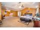 Spacious main bedroom with carpet flooring and ceiling fan and a sitting area at 4230 Spur Look Xing, Douglasville, GA 30135