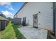 Townhome patio with concrete flooring and green grass at 7708 Fawn Cir, Covington, GA 30014