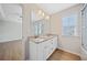 Bathroom featuring a double sink vanity, granite countertops, and a tub-shower combo at 7708 Fawn Cir, Covington, GA 30014