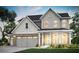 Two-story home with brick and gray siding, complemented by a neatly manicured lawn at 5410 Julep Ct, Cumming, GA 30028