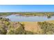 Aerial view overlooking the lake and gorgeous real estate at 8078 Longleaf Dr, Villa Rica, GA 30180