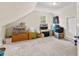 Spacious attic features carpet, a window and is well-lit at 8078 Longleaf Dr, Villa Rica, GA 30180