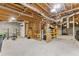 Unfinished basement with exposed wood framing, concrete floor, and visible ductwork, offering potential for customization at 8078 Longleaf Dr, Villa Rica, GA 30180