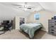 Bedroom featuring a sloped ceiling, closet, and an area that can be used as an office space at 8078 Longleaf Dr, Villa Rica, GA 30180