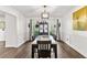 Traditional dining room features dark furniture and great natural light at 8078 Longleaf Dr, Villa Rica, GA 30180
