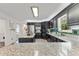 Open concept kitchen boasting granite countertops, stainless steel appliances, and stylish modern finishes at 8078 Longleaf Dr, Villa Rica, GA 30180
