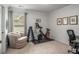 Bedroom with exercise equipment and comfortable seating area at 1514 Gilstrap Nw Ln, Atlanta, GA 30318