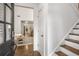 Bright foyer with hardwood floors, stairs, and an open view to the living spaces at 1514 Gilstrap Nw Ln, Atlanta, GA 30318