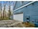 Spacious garage with concrete driveway and exterior features at 1514 Gilstrap Nw Ln, Atlanta, GA 30318