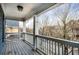An outside porch that gives a view of the neighborhood at 1514 Gilstrap Nw Ln, Atlanta, GA 30318