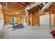 Unfinished basement with exposed ductwork and exercise equipment at 1710 Brandon Lee Sw Way, Marietta, GA 30008