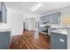 Open-concept kitchen with stainless steel appliances, granite countertops, and hardwood floors at 1710 Brandon Lee Sw Way, Marietta, GA 30008