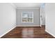 Inviting living room with hardwood floors, natural light, and a view into the front entrance at 1710 Brandon Lee Sw Way, Marietta, GA 30008