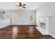 View of the living room, with hard wood floors and fireplace at 1710 Brandon Lee Sw Way, Marietta, GA 30008