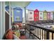 Cozy balcony offering views of the vibrant neighborhood and colorful townhome exteriors at 203 Color Cir, Atlanta, GA 30317