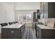 Well-equipped kitchen featuring an island with a sink, modern appliances, and ample counter space at 203 Color Cir, Atlanta, GA 30317
