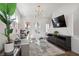 Comfortable living room offering ample seating, a glass coffee table, and stylish decor at 203 Color Cir, Atlanta, GA 30317