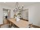 Well-lit dining room shows open layout with access to living area and modern decor at 5310 Julep Ct, Cumming, GA 30028