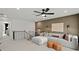 Open concept living room with a sectional sofa and a view of the staircase and landing at 5310 Julep Ct, Cumming, GA 30028