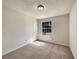 Bedroom with a light carpet and a window that lets in natural light at 9704 Pintail Trl, Jonesboro, GA 30238