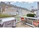 Relaxing back deck with patio furniture, grill, and views of the surrounding neighborhood at , Alpharetta, GA 30022