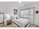 A bright bedroom with a cozy bed and large window, perfect for relaxing at 44 Hall Mnr, Alpharetta, GA 30022