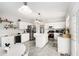 Spacious kitchen with white cabinets, an island, and stainless steel appliances at 3550 Myrtlewood Chase Nw, Kennesaw, GA 30144