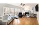 Cozy living room featuring a fireplace, large windows, and comfortable seating at 3550 Myrtlewood Chase Nw, Kennesaw, GA 30144
