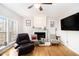 Living room featuring a fireplace and natural light at 3550 Myrtlewood Chase Nw, Kennesaw, GA 30144