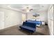 Spacious main bedroom features a tray ceiling, ceiling fan, and an ensuite bathroom at 3550 Myrtlewood Chase Nw, Kennesaw, GA 30144