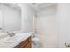Bathroom featuring a shower-tub combo, vanity with sink, and toilet at 6595 Lancelot Ct, Riverdale, GA 30296