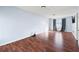 Open bonus room with laminate flooring, a window, and soothing blue paint at 6595 Lancelot Ct, Riverdale, GA 30296