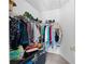 Walk-in closet with shelving, hanging storage, and ample room for organization at 6595 Lancelot Ct, Riverdale, GA 30296