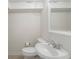 Bright bathroom with a modern sink, commode and mirror at 2947 Margaret Mitchell Nw Ct, Atlanta, GA 30327