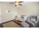 Charming Bedroom featuring a crib, comfortable chair, and a serene atmosphere, perfect for a newborn at 2947 Margaret Mitchell Nw Ct, Atlanta, GA 30327
