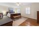 Comfortable bedroom offers hardwood floors, shutters, and ample closet space at 2947 Margaret Mitchell Nw Ct, Atlanta, GA 30327