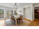 Dining area featuring hardwood floors, French doors, and a view of the back yard at 2947 Margaret Mitchell Nw Ct, Atlanta, GA 30327