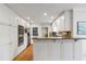 Well-appointed kitchen with white cabinets, granite countertops, and stainless steel appliances at 2947 Margaret Mitchell Nw Ct, Atlanta, GA 30327